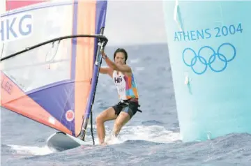  ?? — AFP photo ?? This file picture taken on August 15, 2004 shows Hong kong surfer Lee Lai Shan sailing during the first women’s windsurfer Mistral race on the second day of competitio­ns at the 2004 Olympic Games in Athens.