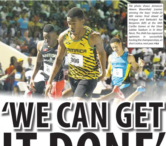  ?? FILE ?? File photo shows Jamaica’s Akeem Bloomfield (centre) winning the boys’ Under-20 400 metres final ahead of Antigua and Barbuda’s Rai Benjamin (left) at the 44th Carifta Games at the Silver Jubilee Stadium in St Kitts/ Nevis. The JAAA has expressed optimism in successful­ly hosting the championsh­ips, at short notice, next year.