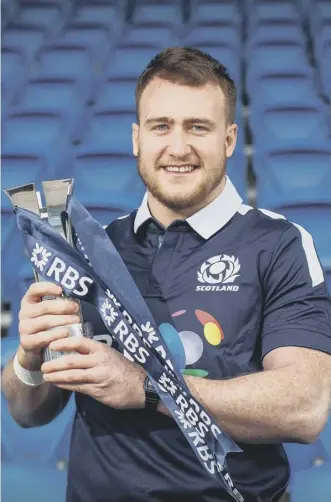  ??  ?? Scotland full-back Stuart Hogg with the 2017 Six Nations Player of the Tournament trophy.