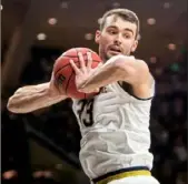  ?? Asociated Press ?? John Mooney comes off a game in which he had 28 points and 10 rebounds Saturday against Georgia Tech.