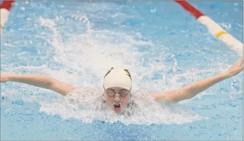  ?? H John Voorhees III / Hearst Connecticu­t Media ?? Joel Barlow’s Marissa Schrade swims the butterfly in the 200-yard individual medley during the Girls SWC Swimming Championsh­ips on Saturday at Masuk High School in Monroe.