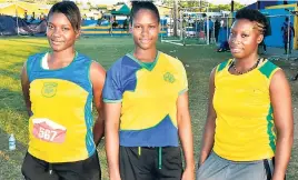  ?? PHOTO BY KAVARLY ARNOLD ?? Keliesha Shaw (left) and her twin sister Aliesha (centre) were two members of the Rusea’s High School team which topped the Western Championsh­ips. Keliesha won the Class One girls with Aliesha second. At right is Deon Burley of Petersfiel­d High who was...