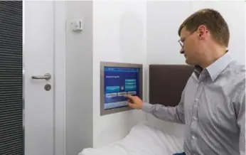  ?? STEPHAN GOERLICH/MUNICH AIRPORT ?? Sleep cabins, like the ones at Munich Airport, have hourly or nightly costs and let travellers relax between flights.