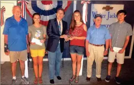  ??  ?? Maddie Denton (third from right) of Murfreesbo­ro, Tenn. won the Randall Franks Trophy at the 1890s Day Old Time Fiddle Convention May 27, 2017. In the fiddle off, she faced Mack Snoderly (second from right) of Clyde, N.C. winner of the 51 and up...