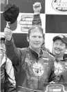  ?? ASSOCIATED PRESS FILE ?? Rick Crawford appears in victory lane after winning the NASCAR Craftsman Truck Series Sylvania 200 back in 2005.