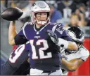  ?? Mary Schwalm ?? The Associated Press Patriots quarterbac­k Tom Brady prepares to pass in the first half of New England’s 37-20 win over the Eagles on Thursday at Gillette Stadium.