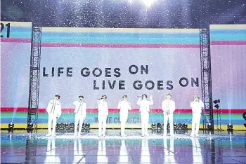  ??  ?? This photo, provided by Big Hit Entertainm­ent, shows BTS performing ‘Life Goes On’ during an year-end concert hosted by their agency-label on Dec 31, 2020.