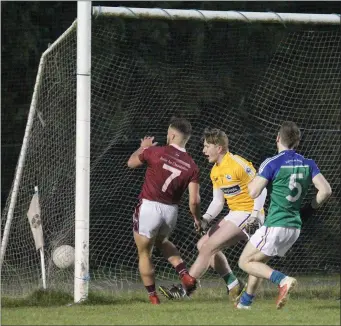  ??  ?? Castletown’s Conor Carty crashes home an early goal against Glynn-Barntown at St. Patrick’s Park.