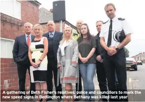  ??  ?? A gathering of Beth Fisher’s relatives, police and councillor­s to mark the new speed signs in Bedlington where Bethany was killed last year