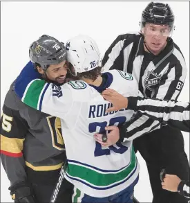  ?? The Canadian Press ?? Ryan Reaves of the Vegas Golden Knights has been mixing it up with the Vancouver Canucks, particular­ly Antoine Roussel, in the first two games of their NHL playoff series, but on Wednesday Reaves and the Canucks were on the same side as they worked toward a two-night postponeme­nt of their playoff series.