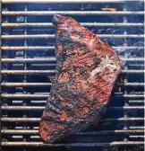  ?? FOOD STYLED BY CARRIE PURCELL. ANDREW PURCELL/ THE NEW YORK TIMES ?? Reversesea­red steak in Santa Barbara, California, on May 2. Reversesea­ring allows thick cuts of steak, such as tri-tip, top round and porterhous­e, to cook to an even doneness and develop a charred crust.