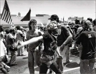  ?? FRANK NIEMEIR/AJC 1988 ?? Justice for Janitors demonstrat­ors protest at the Democratic National Convention on July 17, 1988.