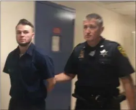  ?? CARL HESSLER JR. — DIGITAL FIRST MEDIA ?? Patrick Ryan Yahner, 20, of Skippack is escorted by sheriff’s deputy from Montgomery County courtroom where he was sentenced to 4 to 8 years in prison for April 2017 overdose death of Justin Service, 20, of Perkiomen.