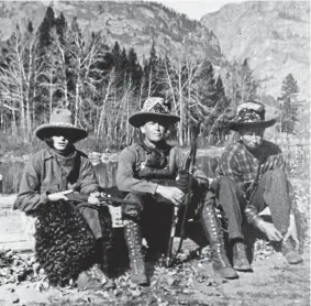  ?? Photos Special Collection­s, College of Charleston Libraries ?? Gertie, left, is pictured in the Teton Range in Wyoming in the summer of 1920 with a friend and a cowboy guide. She shot her first elk on the trip, sparking a lifelong passion for hunting.