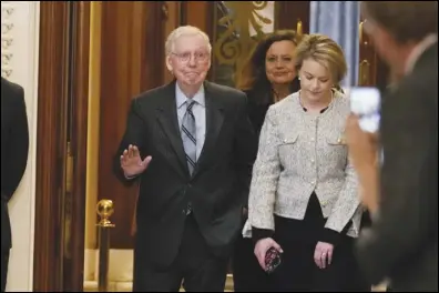  ?? ASSOCIATED PRESS ?? Senate Minority Leader Mitch McConnell of Ky., walks off the Senate floor at the Capitol in Washington after speaking Wednesday. McConnell says he’ll step down as Senate Republican leader in November.