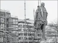  ?? CP FILE PHOTO ?? A statue of British commander Edward Cornwallis is removed from its pedestal in downtown Halifax earlier this winter.