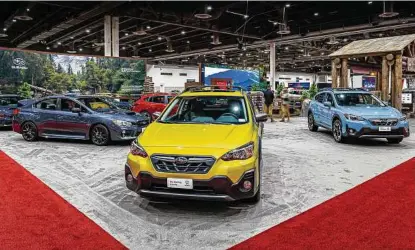  ?? Courtesy of Egidio Narvaez Photograph­y ?? Subaru of America will again host pet adoptions as part of its Subaru Loves Pets initiative. More than 200 animals have found homes since Subaru began organizing the events at auto shows in 2018.