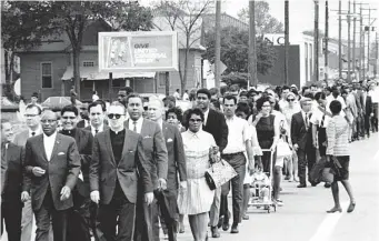  ?? Houston Chronicle file ?? Houstonian­s marched in the days following the assassinat­ion of Martin Luther King Jr. in April 1968.