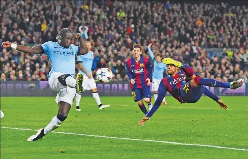  ?? DAVID RAMOS/GETTY IMAGES ?? Neymar of Barcelona performs a scissor kick as he is closed down by Bacary Sagna of Manchester City.