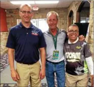  ?? JACK O’BREZA — THE NEWS-HERALD ?? Wickliffe Lanes co-general manager Randy Gierman, Pete Weber and Kenny Seymour.