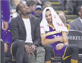  ?? Scott Strazzante / The Chronicle ?? With the season near an end and Kevin Durant yet to return from his knee injury, he and Stephen Curry have yet to strike the ideal working relationsh­ip.