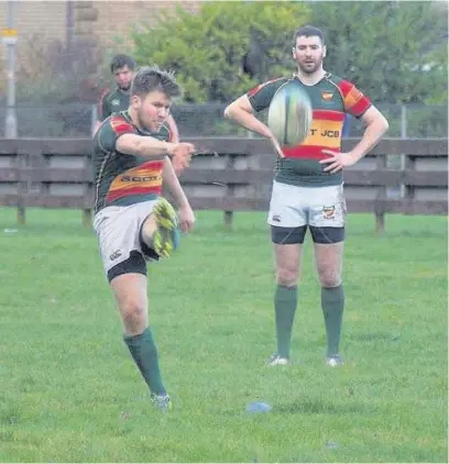  ??  ?? Conversion
Euan Jones, watched by Greg Morrison, added a couple of points with his boot on Saturday