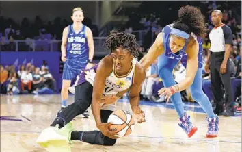  ?? Kamil Krzaczynsk­i Associated Press ?? forward Nneka Ogwumike, left, is coming off her seventh All-Star season after averaging 18.1 points.