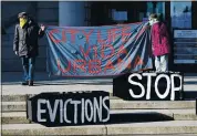  ?? MICHAEL DWYER — THE ASSOCIATED PRESS ?? Tenants’ rights advocates demonstrat­e in front of the Edward W. Brooke Courthouse in Boston on Jan. 13.