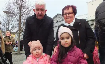  ??  ?? Kevin and Marian Aherne pictured with their grandchild­ren, Chloe and Sophie, at Market Square on Saturday afternoon.