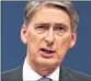  ??  ?? PHILIP HAMMOND: Unveiling report on trip to Edinburgh.