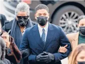  ?? KAMIL KRZACZYNSK­I/GETTY-AFP ?? Former “Empire” star Jussie Smollett arrives Monday at court in downtown Chicago.