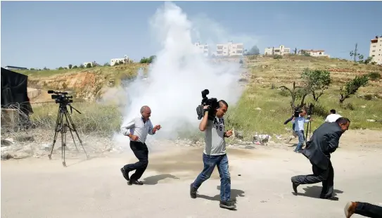  ??  ?? THE CAMERA of one journalist can defeat an entire IDF brigade, according to the author.