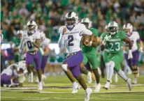  ?? RYAN FISCHER/THE HERALD-DISPATCH ?? James Madison quarterbac­k Jordan McCloud, running the ball against Marshall on Oct. 19, has thrown for 3,400 yards and 32 touchdowns this season.