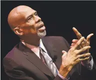  ?? Catherine Avalone / New Haven Register ?? NBA legend Kareem Abdul- Jabbar is interviewe­d by political sportswrit­er Dave Zirin in 2017 at Southern Connecticu­t State University.