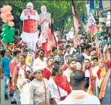  ?? AP ?? BJP supporters at a rally in Kolkata on April 5.