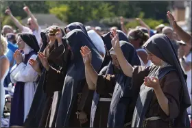  ?? (AP/Darron Cummings) ?? Attendees pray during a “rosary rally” on Sunday in Norwood, Ohio.