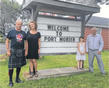  ??  ?? New residents in Port Morien are embracing the Cape Breton lifestyle. Jim Heron and Mona Kirkwood, left, operate the Old Rectory Bed and Breakfast while Ray Whiffen lives on a property at the entrance to the village that is referred to as the Mine Manager’s House with his wife Darlene and granddaugh­ter, Ava.