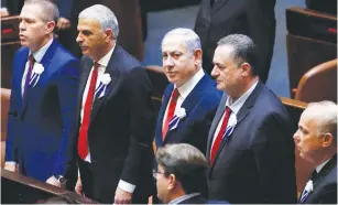  ?? (Ronen Zvulun/Reuters) ?? PRIME MINISTER Benjamin Netanyahu attends the swearing-in ceremony of the 22nd Knesset last week.