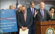  ?? J. SCOTT APPLEWHITE / ASSOCIATED PRESS ?? Sen. Patrick Leahy, D-Vt., speaks as Senate Democrats hold a news conference to criticize President Trump’s tax cuts and push a $1 trillion infrastruc­ture package, at the Capitol, Wednesday.