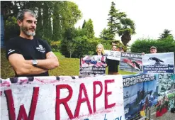  ??  ?? PORTOROZ: Protestors hold up a placard reading ‘It’s time to take whale meat off the menu’ as they demonstrat­e in front of the venue for the 66th Internatio­nal Whaling Commission (IWC) meeting. — AFP