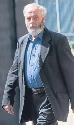  ??  ?? Gerald Sunnie arrives at Dundee Sheriff Court.