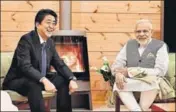  ?? PTI ?? Prime Minister Narendra Modi in an informal meeting with his Japanese counterpar­t, Shinzo Abe, in Japan’s Yamanashi on Sunday.