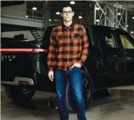  ?? LYNDON FRENCH/THE NEW YORK TIMES ?? R.J. Scaringe, chief executive of Rivian, poses on Jan. 13 at the company’s factory in Normal, Ill.