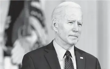  ?? ALEX BRANDON/AP ?? President Joe Biden’s bipartisan bona fides have defined his career, but the pandemic and lessons learned from Republican obstructio­nism during the Obama years is leading him to act quickly on a $1.9 trillion COVID-19 aid bill.