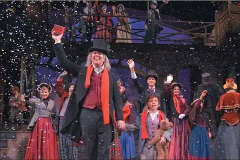  ??  ?? Michael Ray Wisely, center, stars as Ebenezer Scrooge in Center Repertory Company’s long-running production of “A Christmas Carol.” KEVIN BERNE — CENTER REPERTORY COMPANY