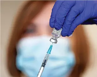  ?? ?? Labour fears a shortage of NHS staff if many refuse to have the Covid vaccine