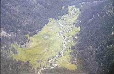  ?? KARL MONDON — STAFF PHOTOS ?? The North Fork of Prosser Creek runs through a scenic portion of Carpenter Ranch in the Sierra. Once a fishing retreat for publisher Jim McClatchy and his friends, the land has been preserved from developmen­t under a $10 million deal.