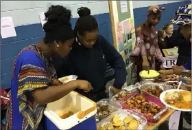  ??  ?? Pictured, from left, participat­ing in Inter Culture Day at Coláiste Bríde were: Lystus Ebosele, Fife Lasisi and Pricilla Akinyemi.