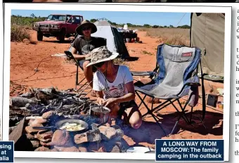  ?? ?? A LONG WAY FROM MOSCOW: The family camping in the outback