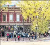  ??  ?? Vancouver’s oldest neighborho­od, Gastown, dates from 1867. It blends cobbleston­e streets, Victorian architectu­re and vintage lampposts with sleek, modern restaurant­s, galleries and boutiques.